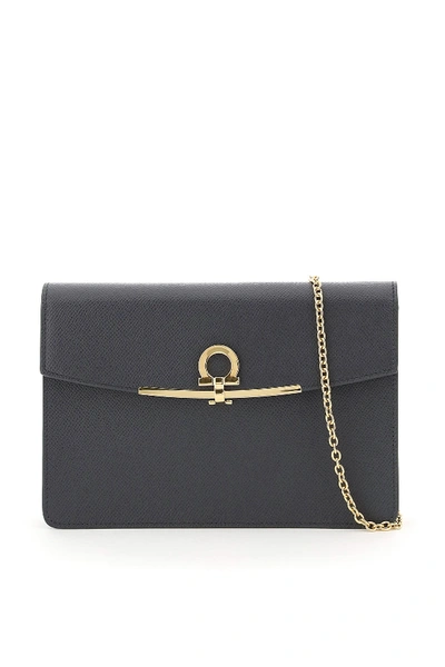 Shop Ferragamo Gancini Clutch With Chain Strap In Stromboli Sand (grey)