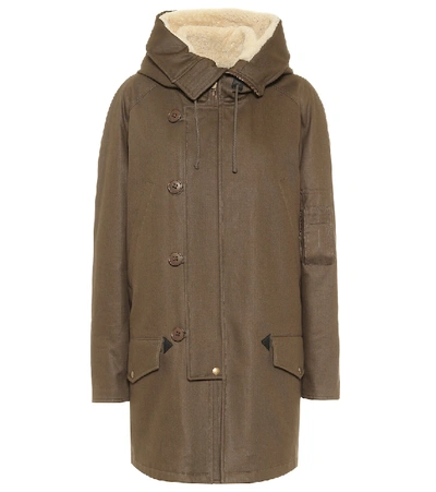 Shop Saint Laurent Shearling Parka Coat In Green