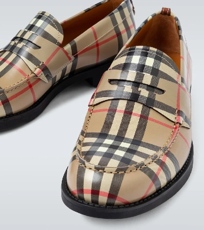 Shop Burberry Emile Checked Loafers In Beige
