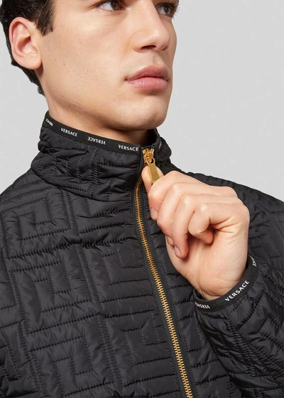 Shop Versace Greca Pattern Quilted Jacket In Black