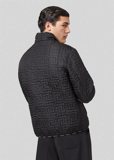 Shop Versace Greca Pattern Quilted Jacket In Black