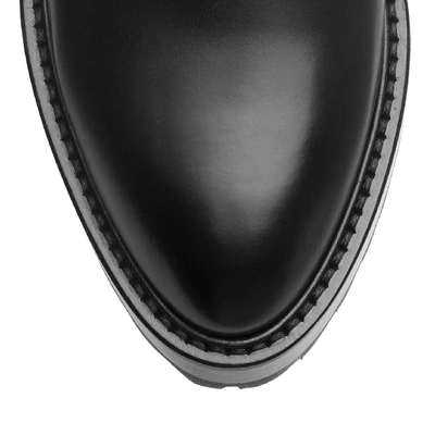 Shop Alaïa Studded Leather Flat Ankle Boots