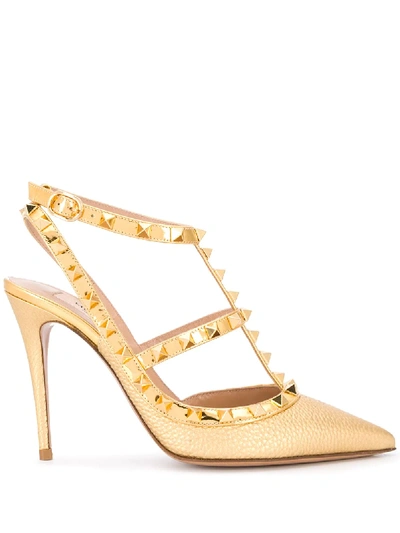 Shop Valentino Rockstud 100mm Pumps In Gold