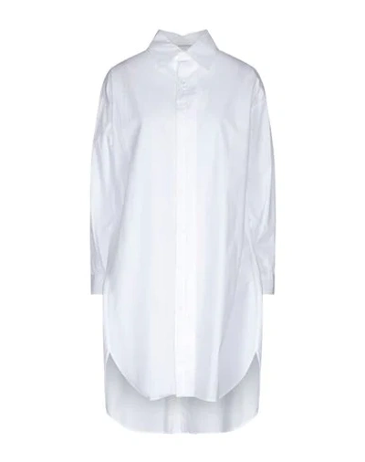 Shop Yohji Yamamoto Solid Color Shirts & Blouses In White