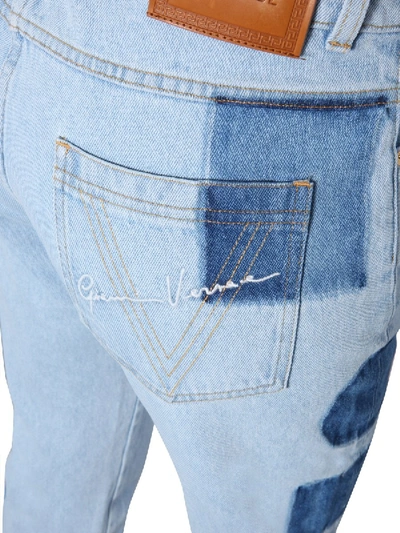 Shop Versace "signature" Jeans In Denim