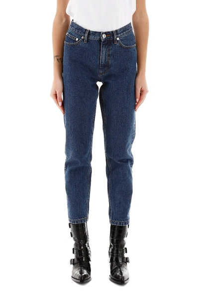 Shop Apc X Carhartt A.p.c. X Carhartt Jeans With Logo On Back In Indigo Delave