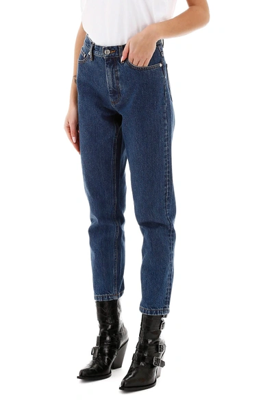 Shop Apc X Carhartt A.p.c. X Carhartt Jeans With Logo On Back In Indigo Delave