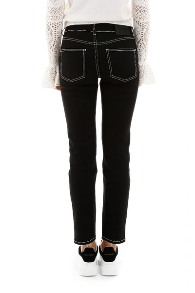 Shop Alexander Mcqueen Jeans With Contrast Stitches In Black