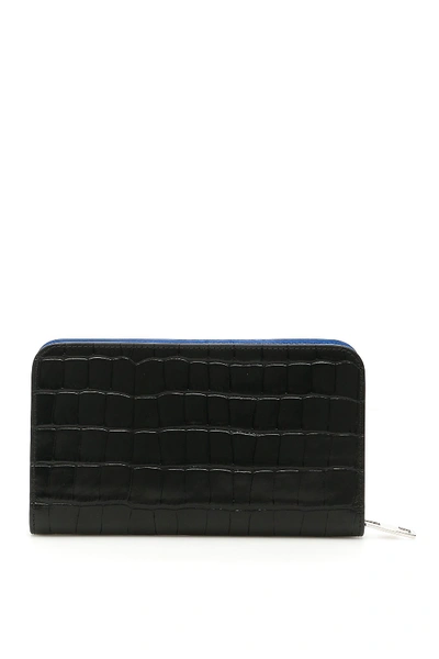 Shop Alexander Mcqueen Zip-around Skull Wallet In Black