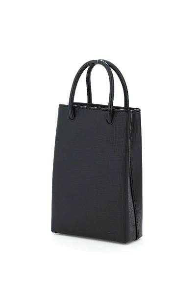 Shop Balenciaga Phone Tote Bag In Black Fluo Orange