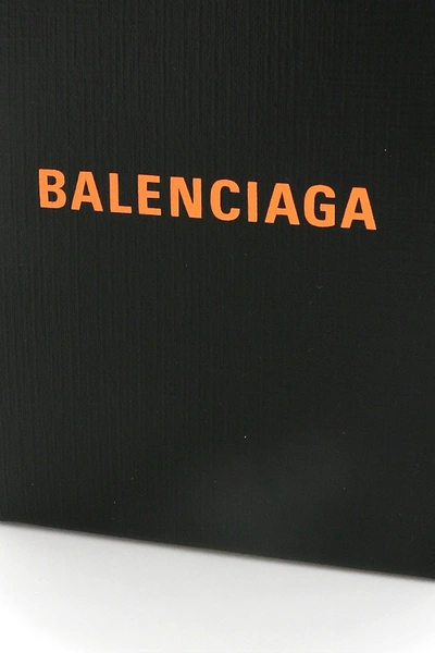 Shop Balenciaga Phone Tote Bag In Black Fluo Orange