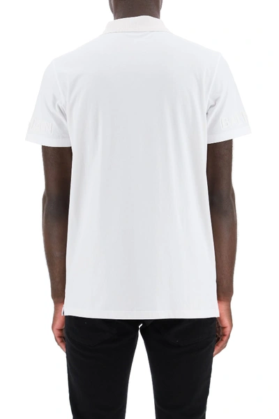 Shop Balmain Polo Shirt With Embossed Logo In Blanc