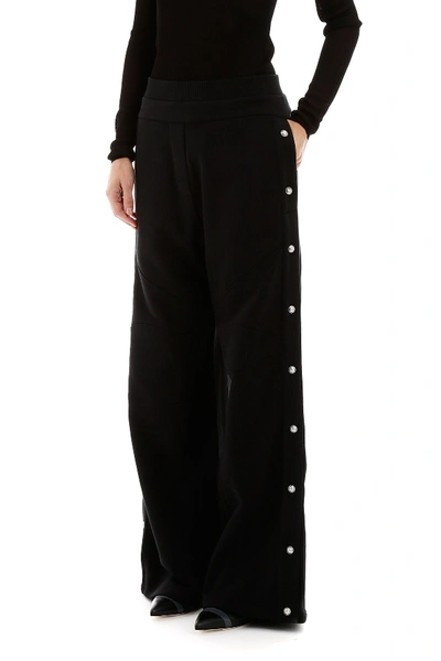 Shop Balmain Trousers With Side Buttons In Noir