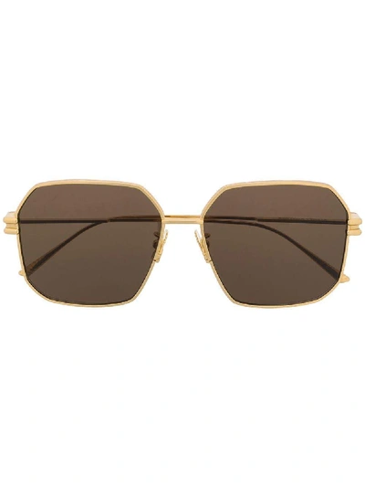 Shop Bottega Veneta Sunglasses In Oro