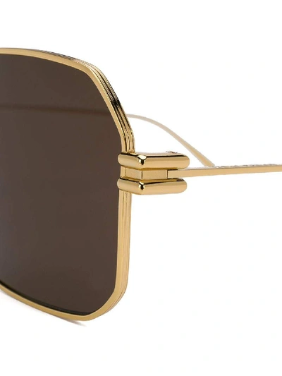 Shop Bottega Veneta Sunglasses In Oro
