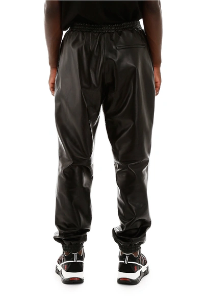 Shop Burberry Leather Joggers In Black