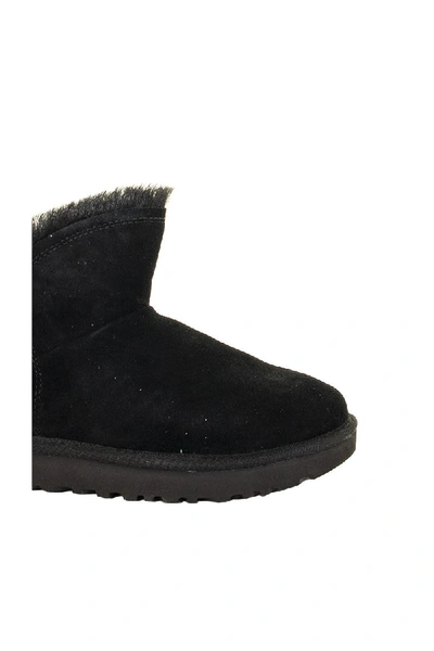 Shop Ugg Classic Fluff Mini Black Boots