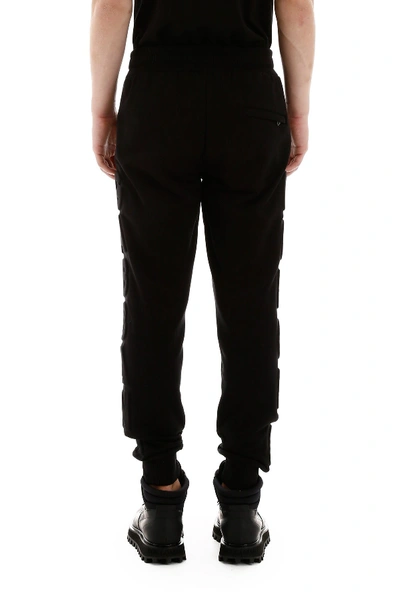 Shop Dolce & Gabbana Joggers With Embossed Logo In Nero