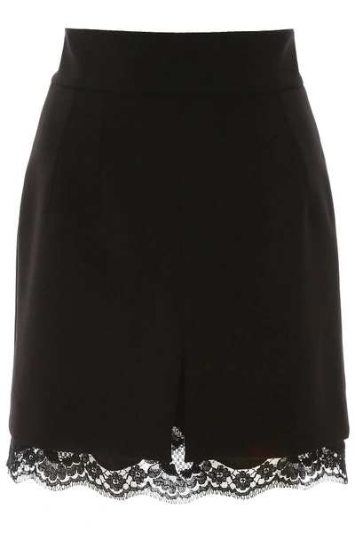 Shop Dolce & Gabbana Mini Skirt With Lace Trim In Nero