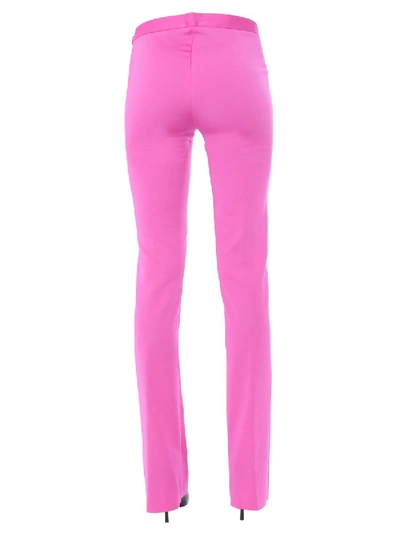 Shop Versace Flared Trousers In Fuchsia