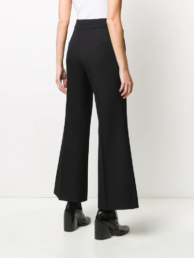 Shop Givenchy Trousers In Nero