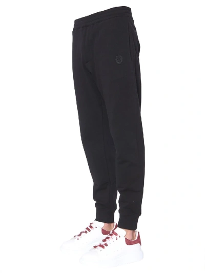 Shop Alexander Mcqueen Jogging Pants With Skull Patches In Black