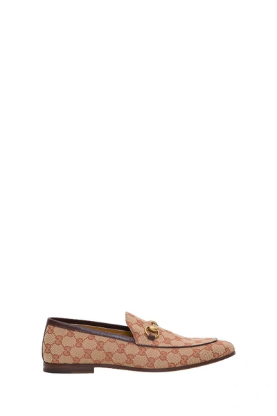 Shop Gucci Jordaan Gg Canvas Loafer In Beige