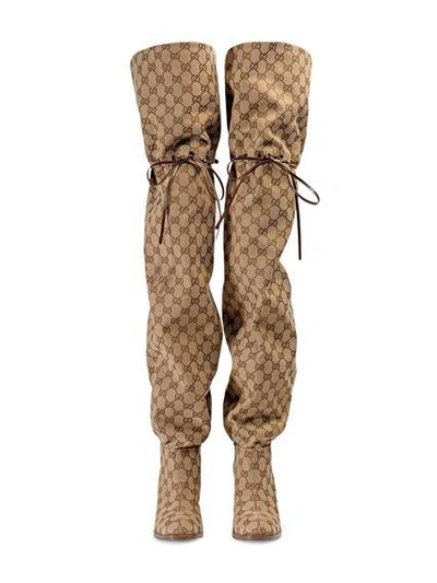 Shop Gucci Knee Boots With Gg Print In Oro