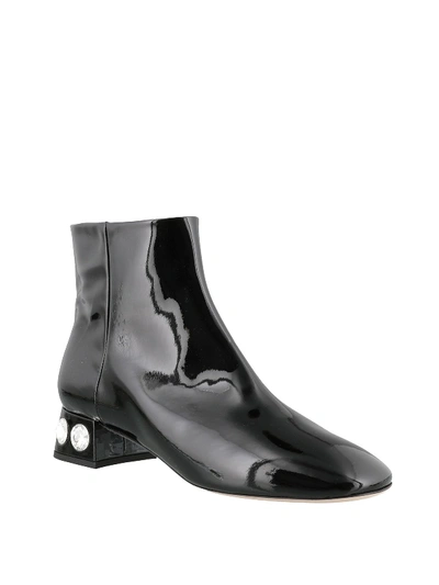 Shop Miu Miu Leather Ankle Boots With Crystals In Nero