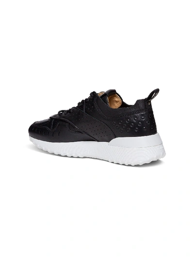 Shop Tod's Leather Sneakers In Black