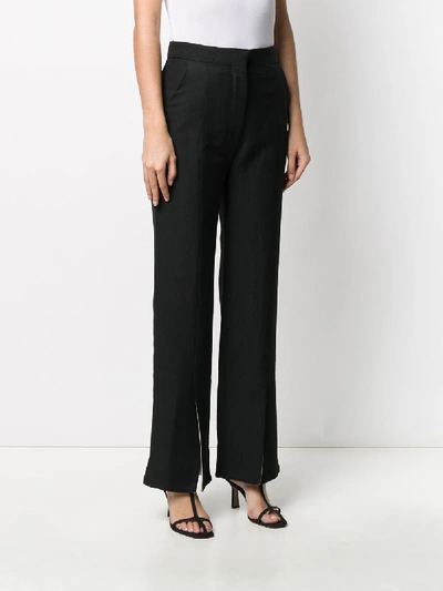 Shop Loewe Trousers In Nero