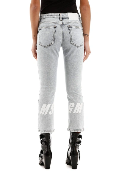 Shop Msgm Cropped Jeans With Logo On Back In Medium Blue