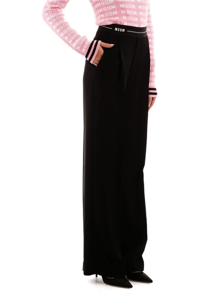 Shop Msgm Wide Leg Trousers With Jacquard Logo In Nero