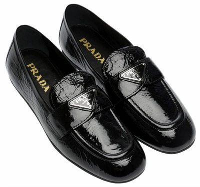 Shop Prada Flat Shoes In Nero