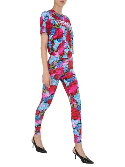 Shop Versace Printed Leggings In Multicolour