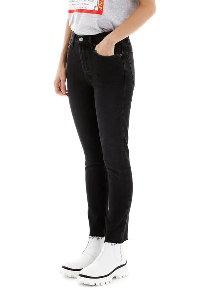 Shop Re/done Skinny High Rise Jeans In Faced Black