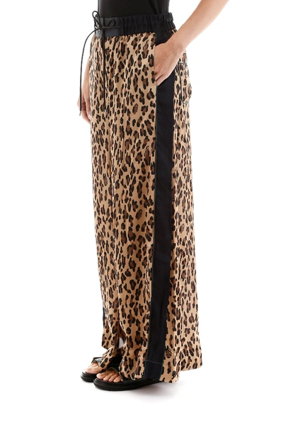 Shop Sacai Leopard Print Trousers In Animalier