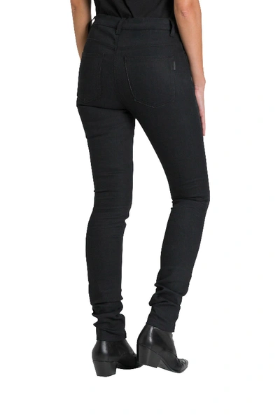 Shop Saint Laurent Skinny Jeans In Black