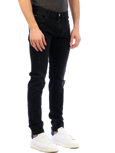 Shop Dolce & Gabbana Skinny Jeans In Black Denim