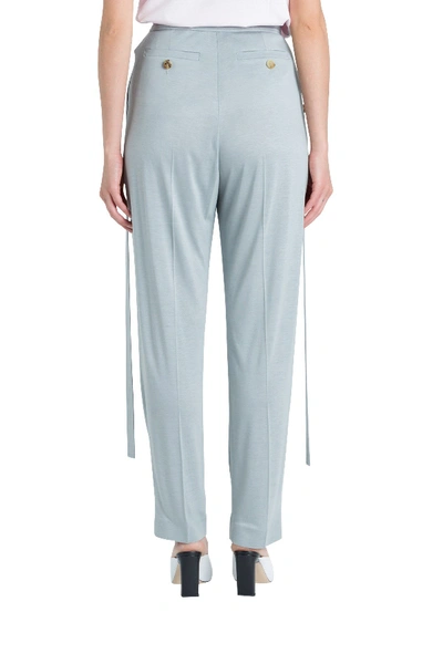 Shop Burberry Strap Detailed Slouchy Trousers In Grey