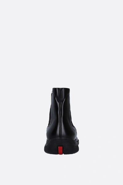 Shop Prada Toblach Ankle Boot In Black Leather