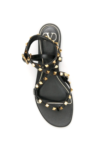 Shop Valentino Garavani Rockstud Thong Flat Sandals In Nero