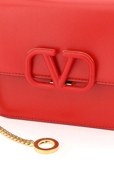 Shop Valentino Garavani Small Vsling Shoulder Bag In Rouge Pur