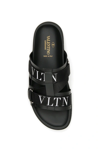 Shop Valentino Garavani Vltn Slide Sandals In Nero