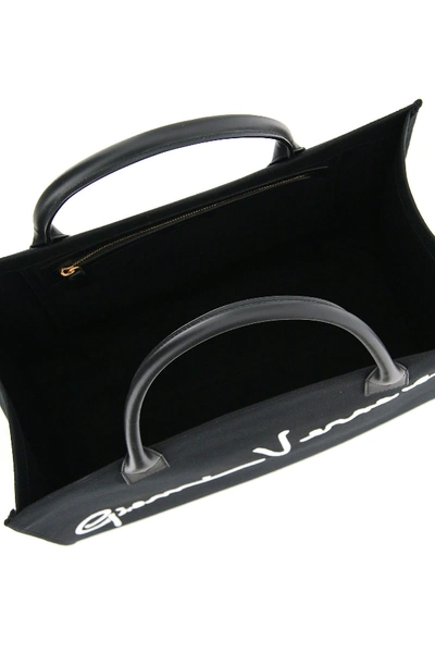 Shop Versace Canvas Tote Bag With Logo Signature In Nero Bianco Ottico Oro Tribute