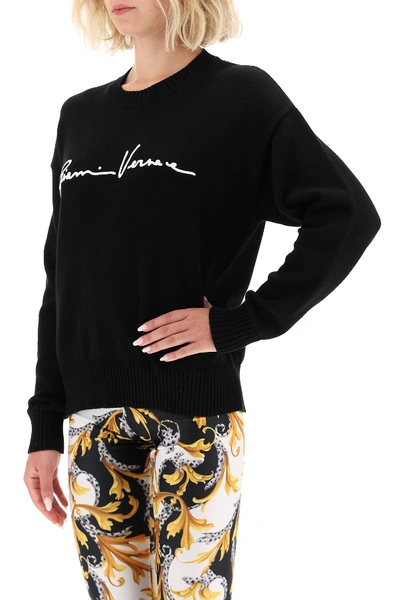 Shop Versace Gv Signature Sweater In Nero