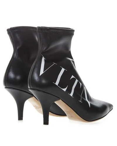Shop Valentino Vltn Ankle Boot In Nero