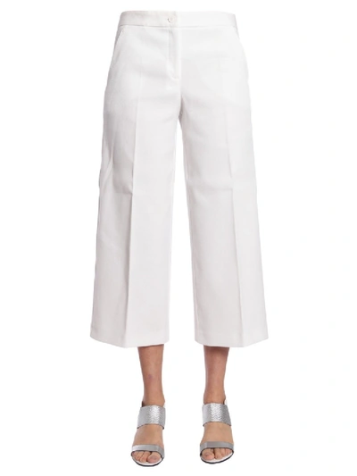 Shop Boutique Moschino Wide Trousers In White