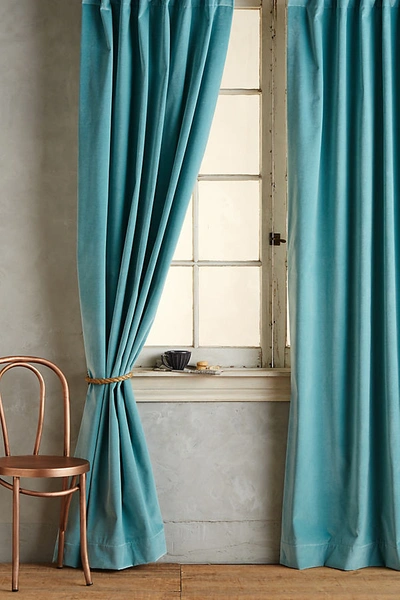 Shop Anthropologie Matte Velvet Curtain By  In Blue Size 50x63