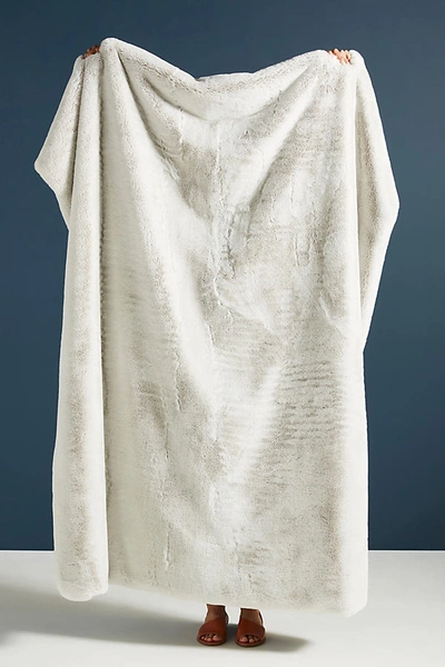Shop Anthropologie Sophie Faux Fur Throw Blanket In Grey